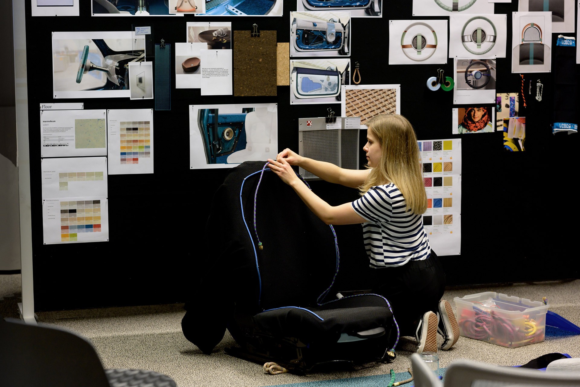 Team staff adjusting seats  Team staff adjusting seats